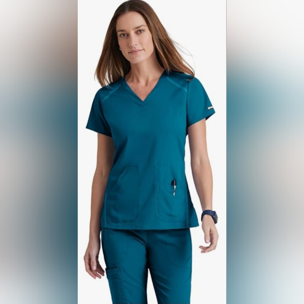 Greys anatomy NWT small crossover v neck impact 3 pocket Bahama blue scrub Top
